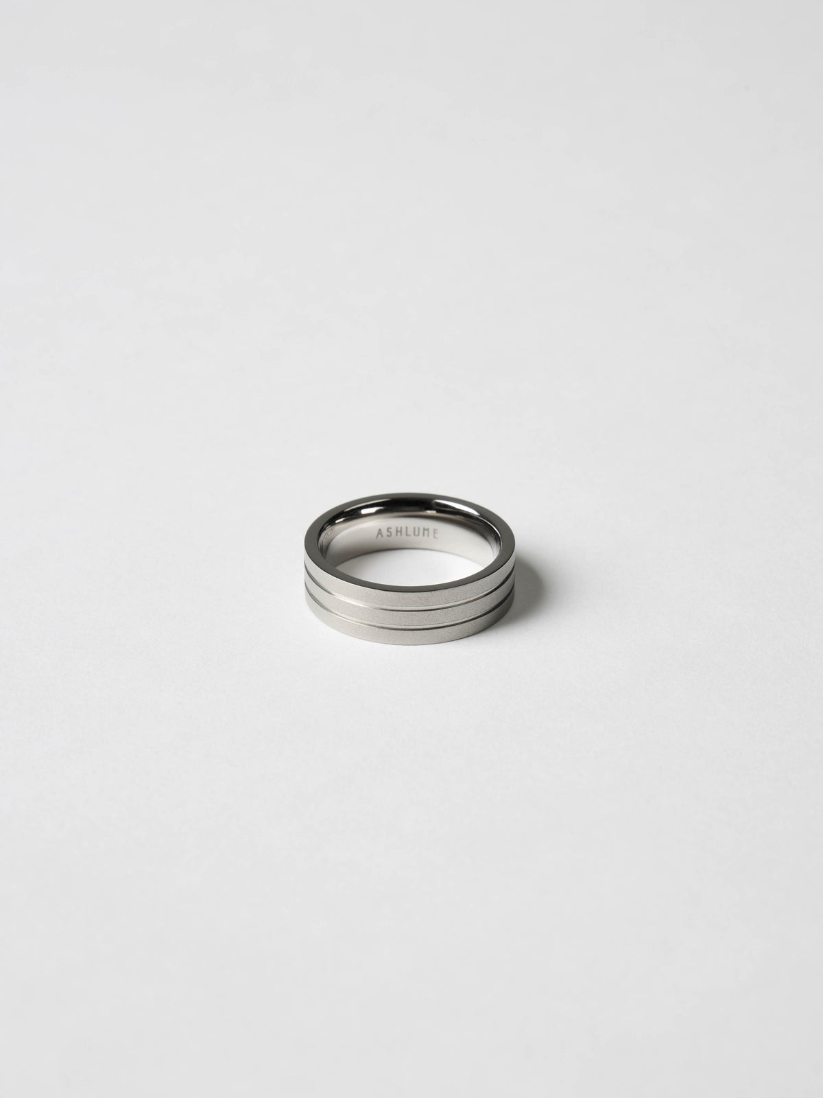 ASHLUME Tres Ring 7mm brushed titanium band on white background